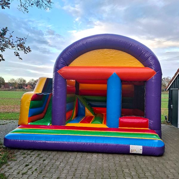 springkussen regenboog huren